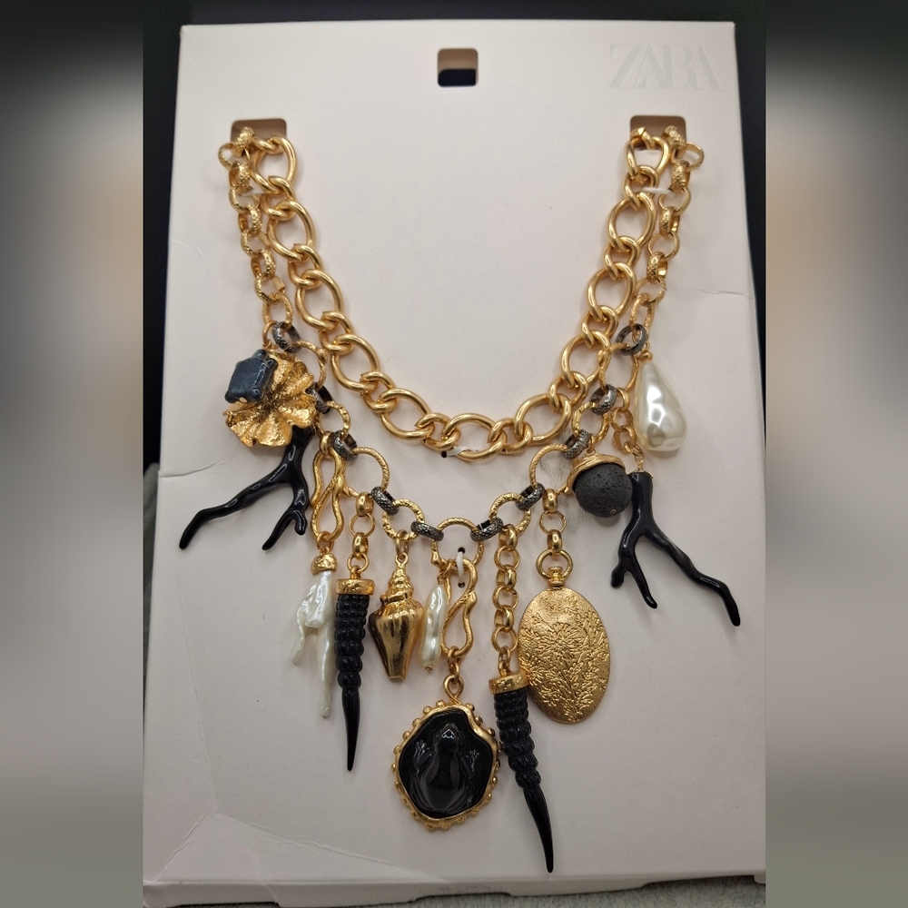 Gold Charm Necklace with Black Accents